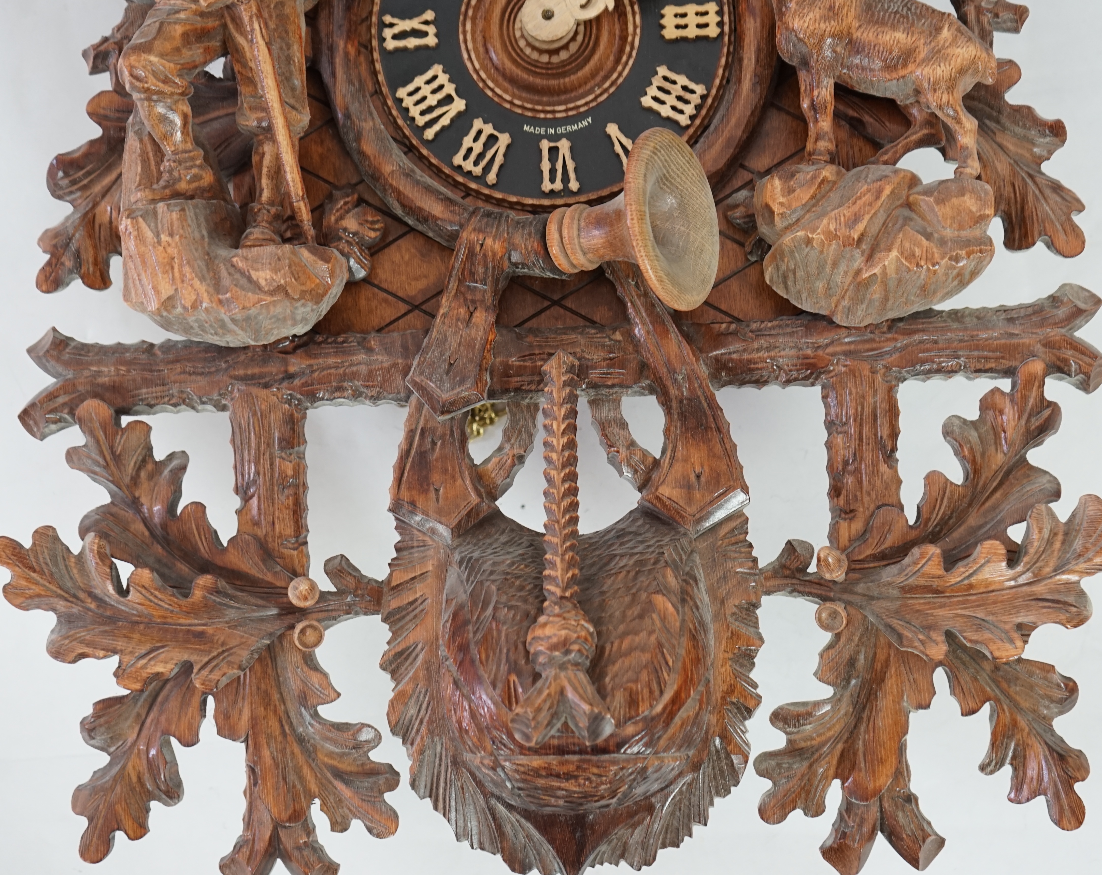 A Hönes Black Forest carved wood cuckoo clock
